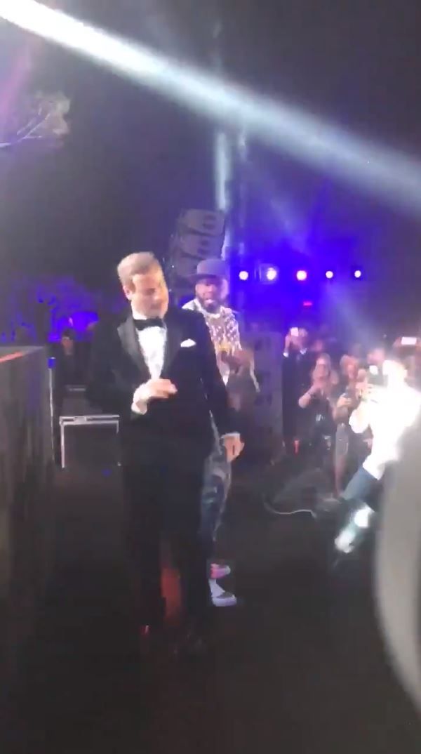 John Travolta Celebrated Grease's 40th Anniversary By Jumping On Stage With 50 Cent